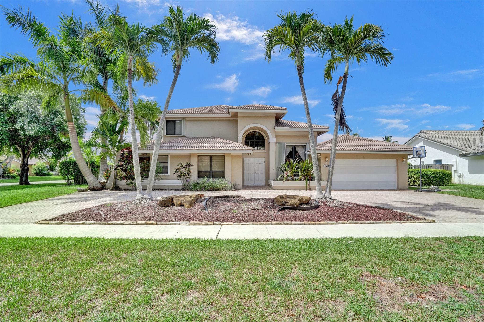 Welcome to this one-of-a-kind 5-bed, 3-bath pool home on oversized corner lot in highly sought-after Westport! This spacious 2-story residence offers a thoughtfully designed layout, featuring eat-in kitchen w/ granite, island & bar seating—ideal for gatherings & everyday living. Enjoy sep. formal living & dining rooms, along w/ family room for added comfort. Upstairs, expansive primary suite boasts balcony, walk-in closet & bath w/ dual vanities, roman tub & sep. shower. 4 BR's downstairs, incl. one w/ en-suite bath. Fenced yard ideal for entertaining w/ screened-in patio & pool. Additional highlights incl. 2-car garage, paver circular driveway, acc. shutters, recessed lighting, volume ceilings & freshly painted exterior (2023). Don’t miss this amazing opportunity—priced to sell quickly!