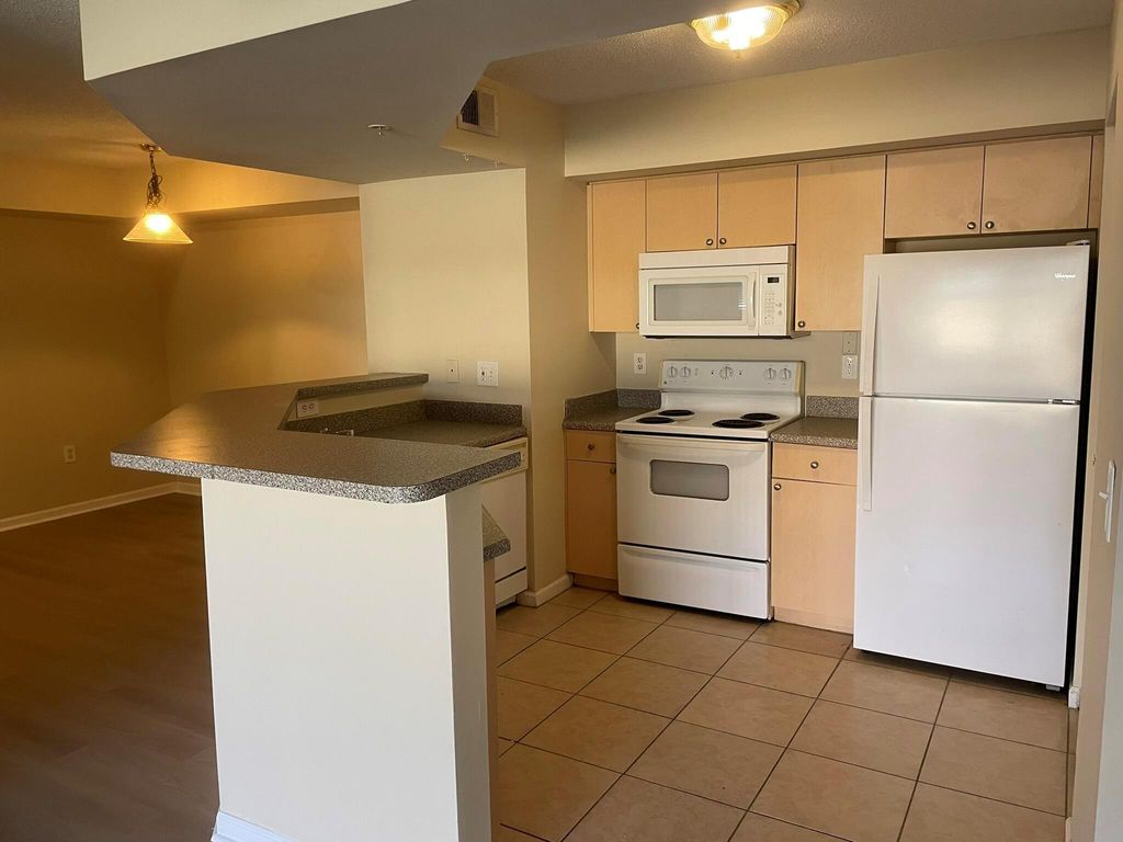 Photo of 3605 NW Adriatic Lane #7-103, Jensen Beach, FL 34957 (MLS # R10985207)