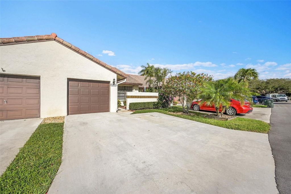 Photo of 415 Buttonwood Place, Boca Raton, FL 33431 (MLS # F10542080)