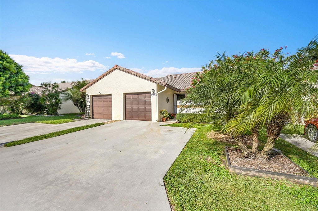 Photo of 415 Buttonwood Place, Boca Raton, FL 33431 (MLS # F10542080)