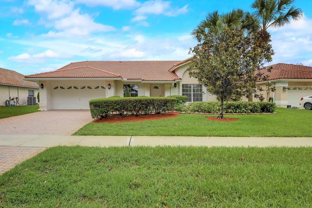 Photo of 7637 Briar Cliff Circle, Lake Worth Beach, FL 33467 (MLS # R10894773)