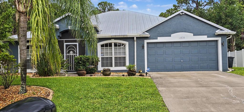 Photo of 1874 SW Nantucket Avenue, Port Saint Lucie, FL 34953 (MLS # B26037211)