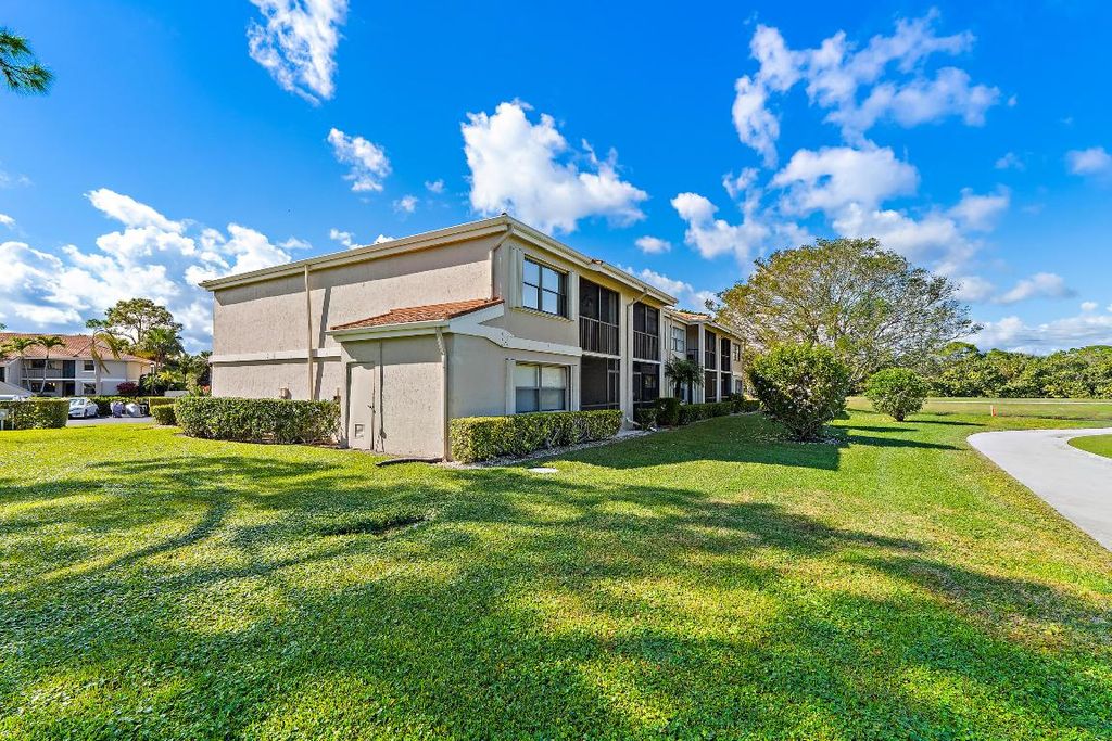 Photo of 13369 Touchstone Place #203, Palm Beach Gardens, FL 33418 (MLS # R11154051)