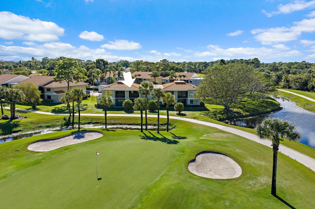 Photo of 13369 Touchstone Place #203, Palm Beach Gardens, FL 33418 (MLS # R11154051)