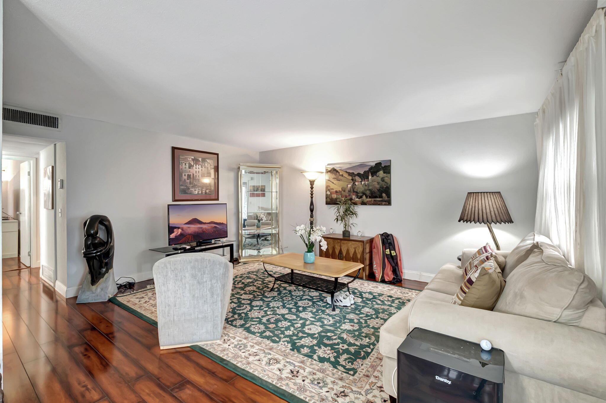 Beautifully maintained 2 bedroom 2 bathroom 2nd floor unit with elevator immediately available for Seasonal or Annual rental. Home includes beautiful laminate flooring throughout, with tile in the bathrooms, abundant storage, washer and dryer and an expansive patio overlooking the canal and golf course ideal for enjoying the Florida lifestyle. Located in the welcoming active adult 55+ community of Kings Point, where residents enjoy the many activities including golf, tennis, pickleball, indoor/outdoor swimming pools. entertainment, restaurants, theaters and more! The community also has courtesy shuttles providing easy and free transportation.