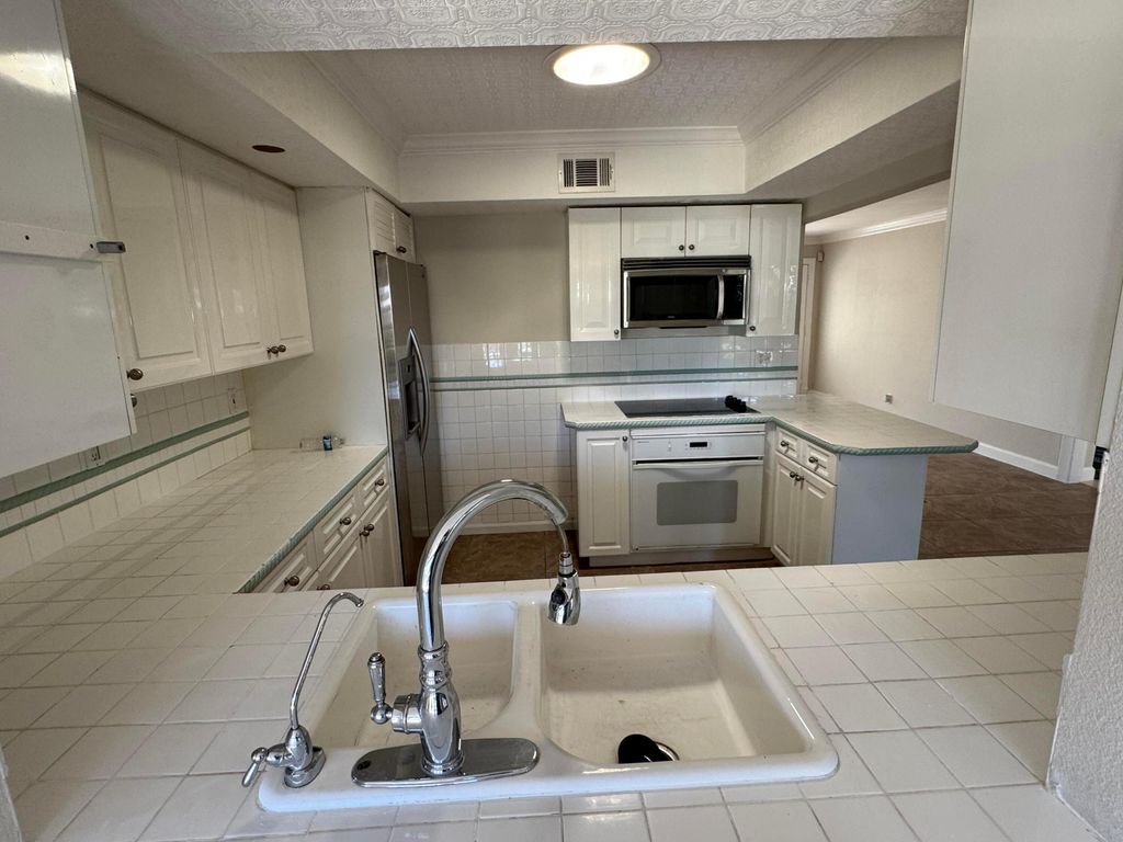 Photo of 349 NE 31st Street, Boca Raton, FL 33431 (MLS # B26020037)