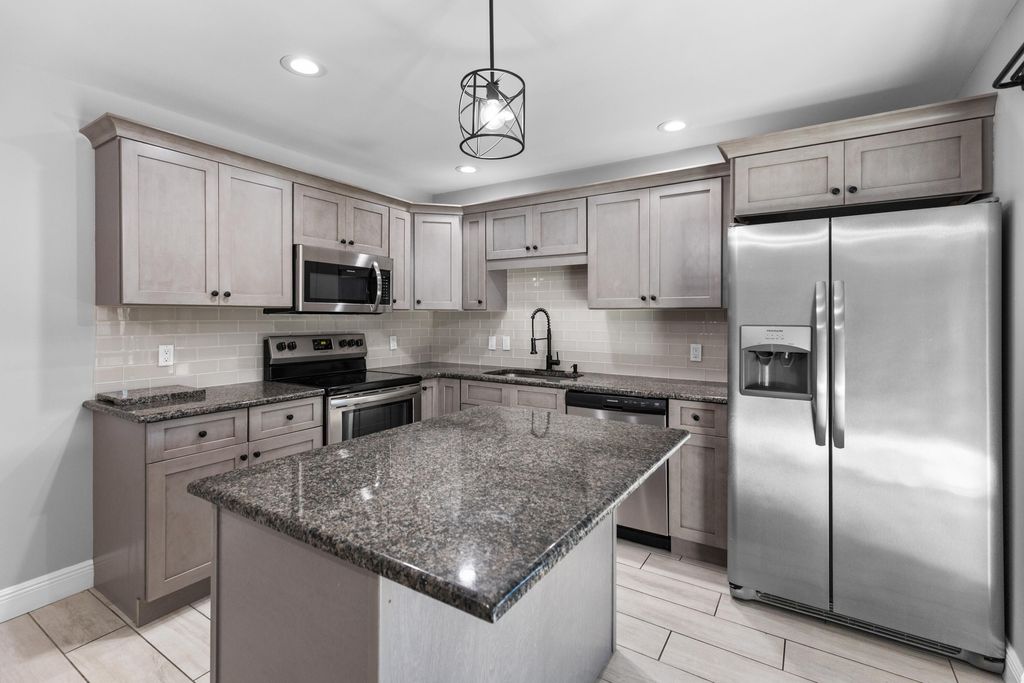 Photo of 2302 SE Round Table Drive #B, Port Saint Lucie, FL 34952 (MLS # R11154475)