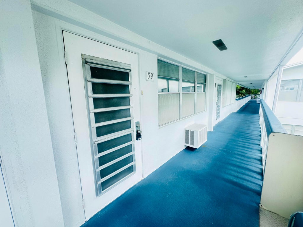 Photo of 59 OAKRIDGE E, Deerfield Beach, FL 33442 (MLS # B26059089)