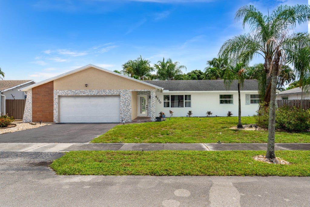 Photo of 6730 NW 26th Terrace, Fort Lauderdale, FL 33309 (MLS # B26035993)