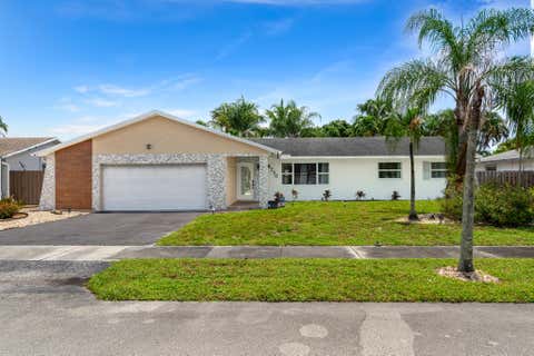 Photo of 6730 NW 26th Terrace, Fort Lauderdale, FL 33309 (MLS # B26035993)