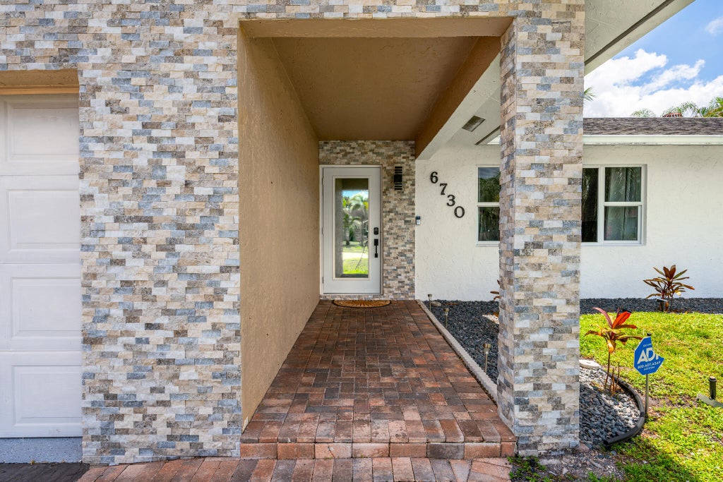 Photo of 6730 NW 26th Terrace, Fort Lauderdale, FL 33309 (MLS # B26035993)