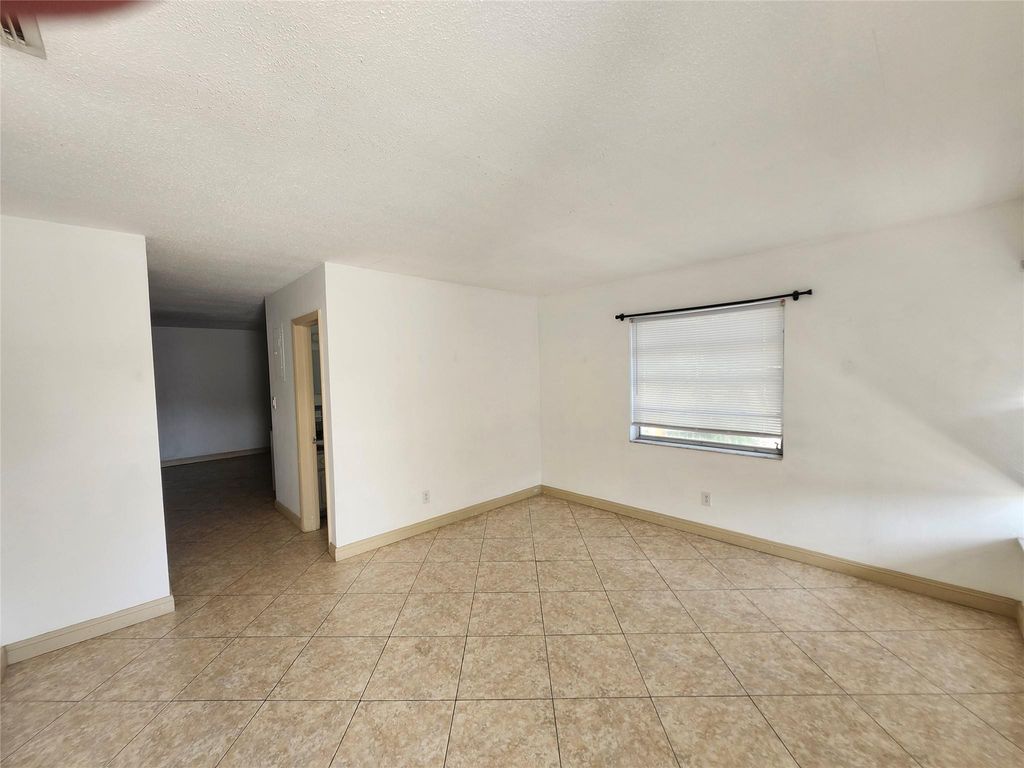 Photo of 701 NE 36th Street, Oakland Park, FL 33334 (MLS # F10556074)