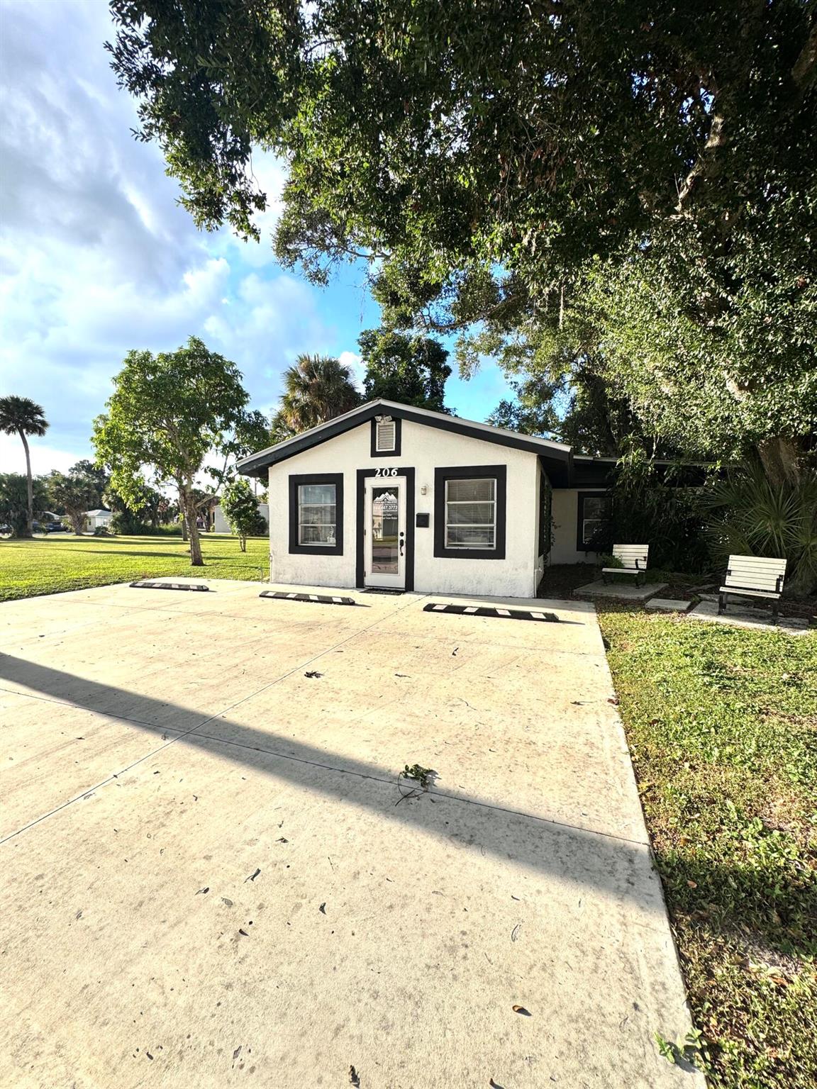 OFFICE-This beautifully remodeled stand alone office is ready to display your business!The front section is a large, open space, perfect for a reception area or multiple desks. There are 3 other offices and a break/storage room along with an updated large bathroom. The new luxury vinyl plank floors, fresh paint and beautiful interior doors make this property perfect for any kind of business. Outside the rear of the building is additional parking along with a storage shed. This property is conveniently located close to Highway 441, Park Street and Highway 70. The land is included with the office.