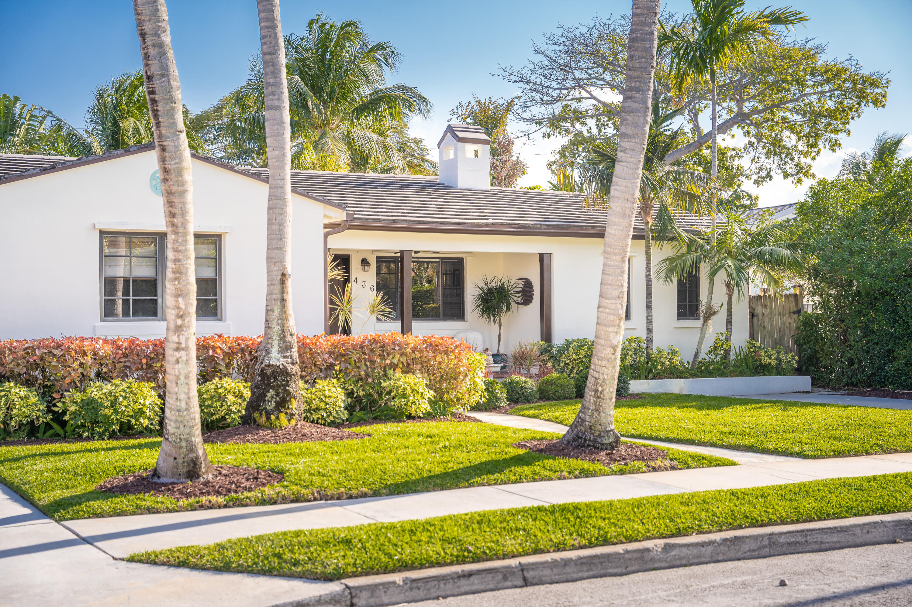 Step inside Casa Tranquillo, this 3 bed / 2 bath all CBS main home featuring an open split floor plan with beautiful tile and wood floors throughout, two large guest rooms, and an expansive owner's suite that walks out to the pool. The 2018 built, extremely large guest cottage features a full 1 bed / 1 bath suite with gracious living area and kitchenette overlooking the pool, and a separate storage area for all of your South Florida toys!Back inside the main home Stainless steel appliances, gorgeous wood cabinetry, plenty of countertop space and a chef's pass through make the kitchen a culinary dream. Dine in the formal dining room with floor to ceiling windows overlooking in the backyard or dine alfresco under the stars