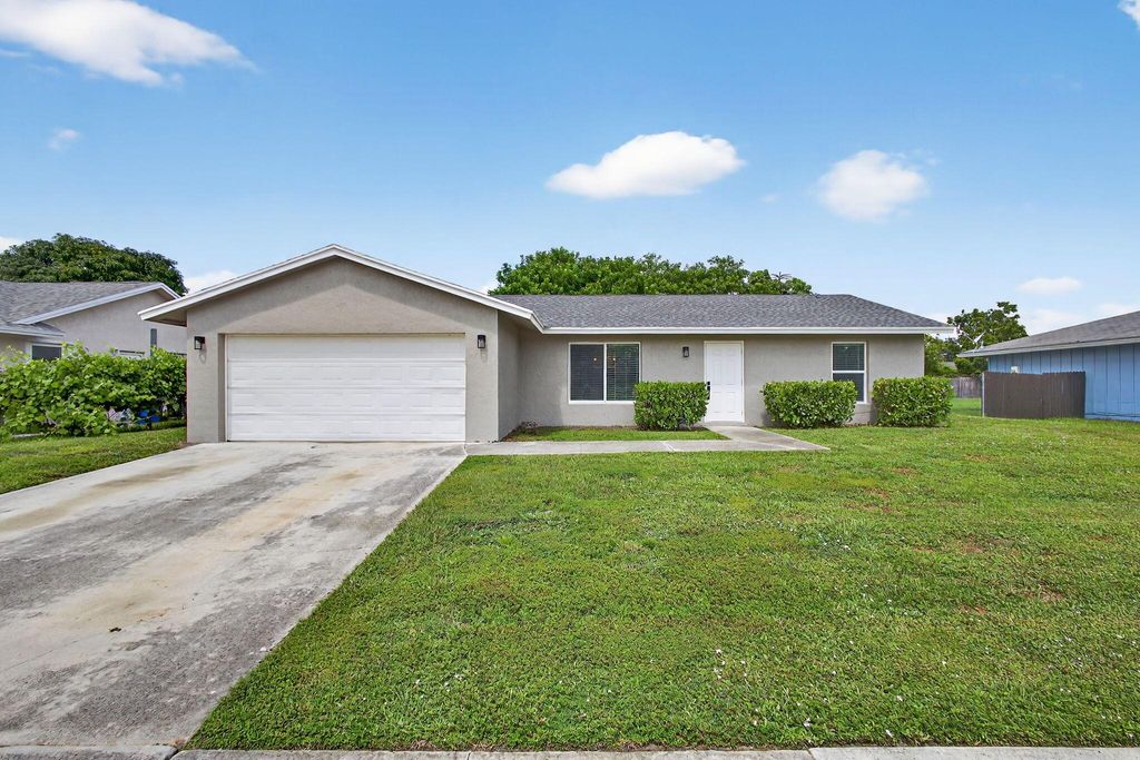 Photo of 316 La Mancha Avenue, Royal Palm Beach, FL 33411 (MLS # R11117877)