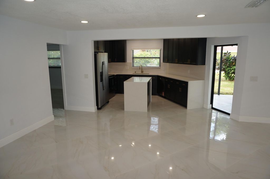 Photo of 1513 39th Street, West Palm Beach, FL 33407 (MLS # B26034476)