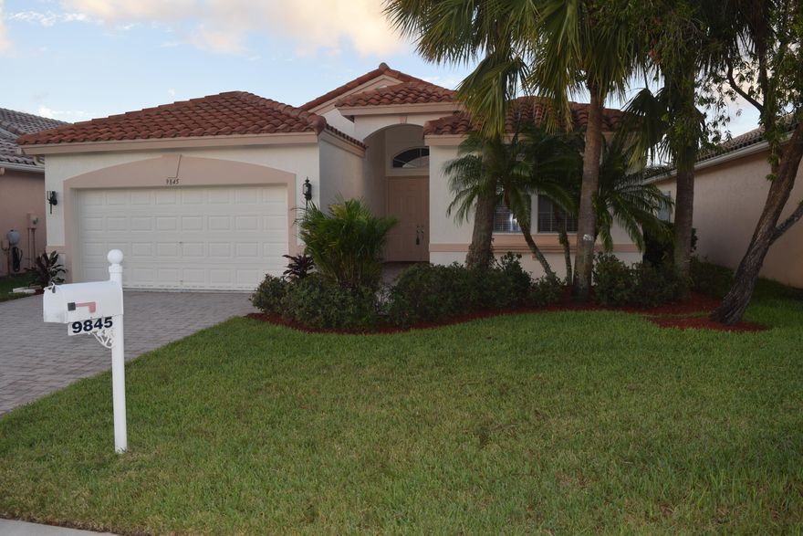 Huge Price Reduction. Welcome to Beautiful Bellaggio, one of the most active adult communities in South Florida. As you enter this Mediterranean Style home, we can't help but notice the Beautiful lake from the Sliding glass doors and extended screened Lanai. This 3 bedroom, 2 bath house has Crown Molding, Wainscoting and Intercom with a radio throughout. The 3rd Bedroom can easily be converted to a Den/Office or Study. The main portion of the home is tiled. House has recently been painted. The tiles have been replaced and both bedrooms have one year old carpeting. Bellaggio now has a  Updated Clubhouse with a new Grand Ballroom, Grand Lounge Room, Club Room and a New Bistro. The Library, Card rooms, Billiard room and Arts and Crafts rooms and fitness Center are completely redone. Bellaggio is a very active community featuring dozens of clubs and activities. The Tennis Center has 10, har-tru courts with tennis professional on site. Five Courts are Lighted for Night play. There are also 2 new professional bocce courts and shuffleboard courts nearby the Tennis Center. Bellaggio attracts top-notch shows featuring star entertainment in its magnificent Grand Ballroom. Bellaggio has an Indoor Pool and a large Outdoor Resort Pool with a Updated Wonderful Cafe. There is so much to do in Beautiful Bellaggio!