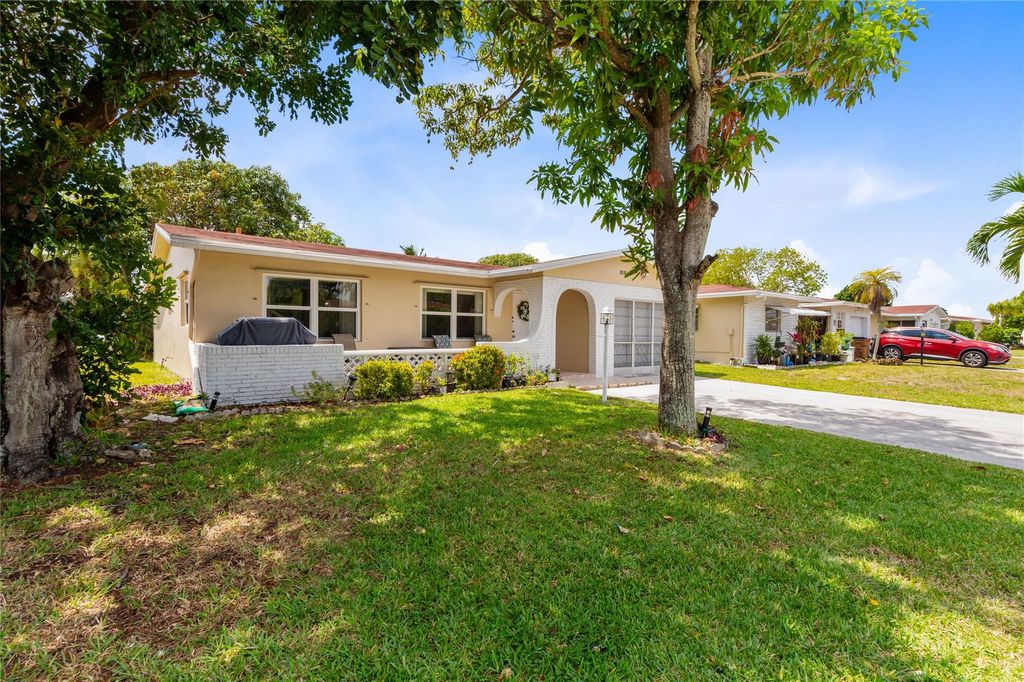 Photo of 1010 NW 49th Court, Deerfield Beach, FL 33064 (MLS # F10516385)