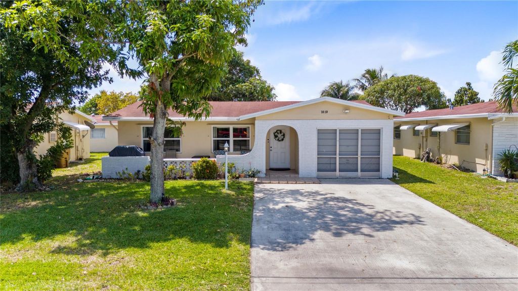 Photo of 1010 NW 49th Court, Deerfield Beach, FL 33064 (MLS # F10516385)