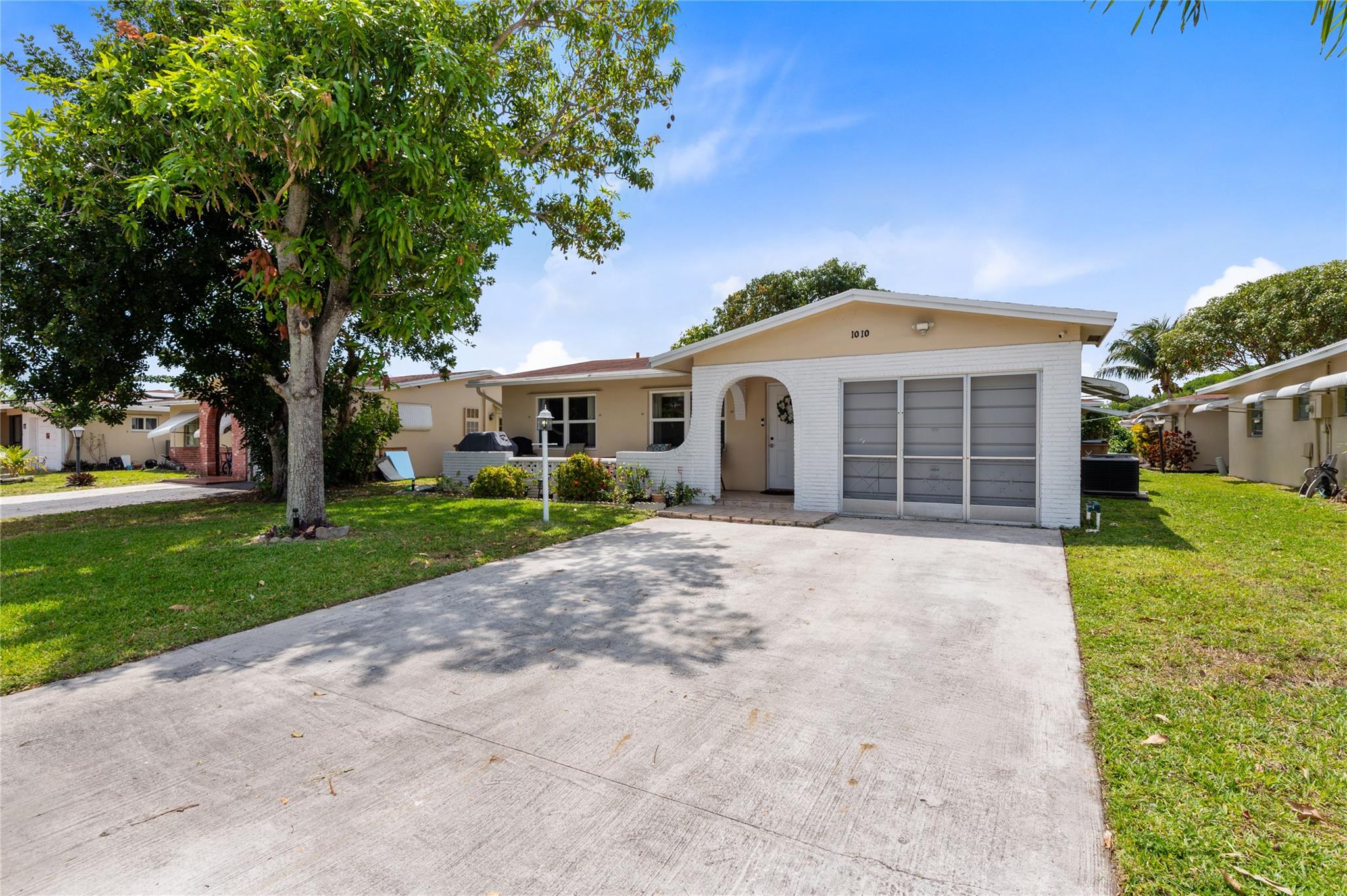 ***$5,000 credit towards the buyer’s closing costs with a full-price offer***.
This spacious and quiet 2-bedroom, 1.5-bath home features tile flooring throughout, a large enclosed Florida room, and newer appliances. Most of the windows are impact-resistant, and the remaining ones are equipped with shutters for full storm protection.
Enjoy the convenience of being just 15 minutes from the beach, with easy access to all major highways, dining, and shopping centers.
The low HOA covers exterior painting, lawn care, cable, and access to a well-equipped clubhouse featuring a pool, gym, sauna, library, billiards, and more providing comfort and lifestyle amenities at an excellent value.
A great location, solid construction, and exceptional value make this home a must-see!