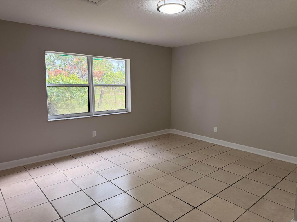 Photo of 407 N 29th Street, Fort Pierce, FL 34947 (MLS # B26002101)