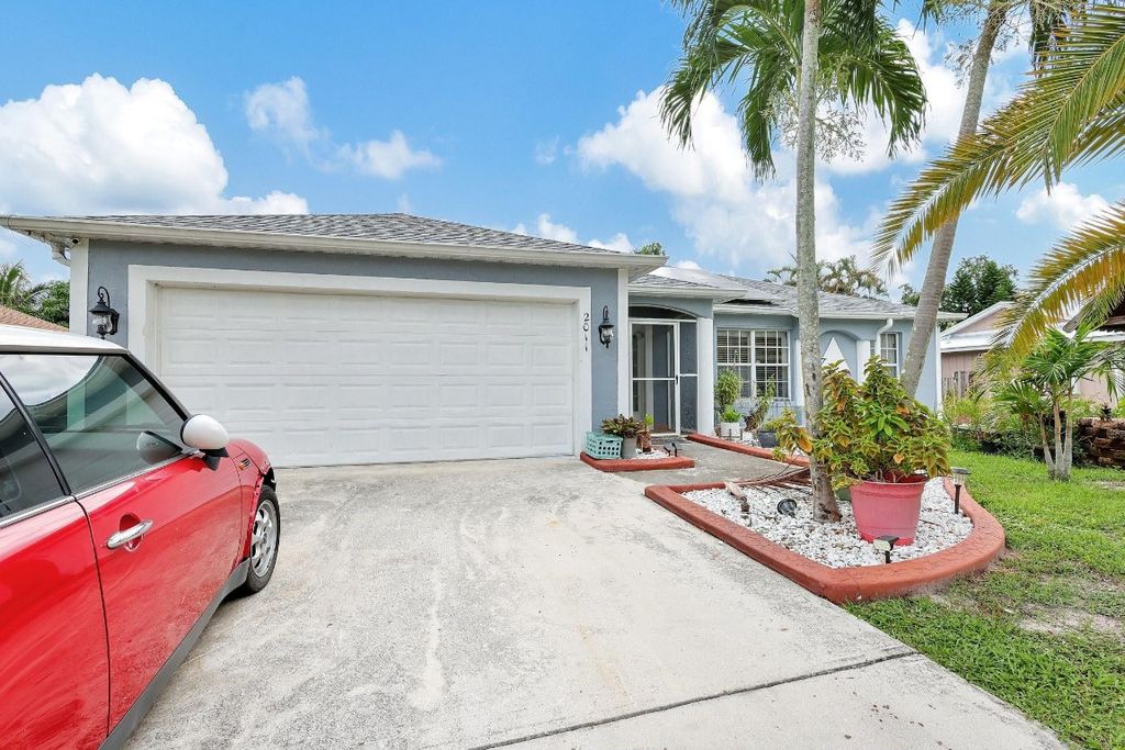 Photo of 2011 SW Judith Lane, Port Saint Lucie, FL 34953 (MLS # F10530459)