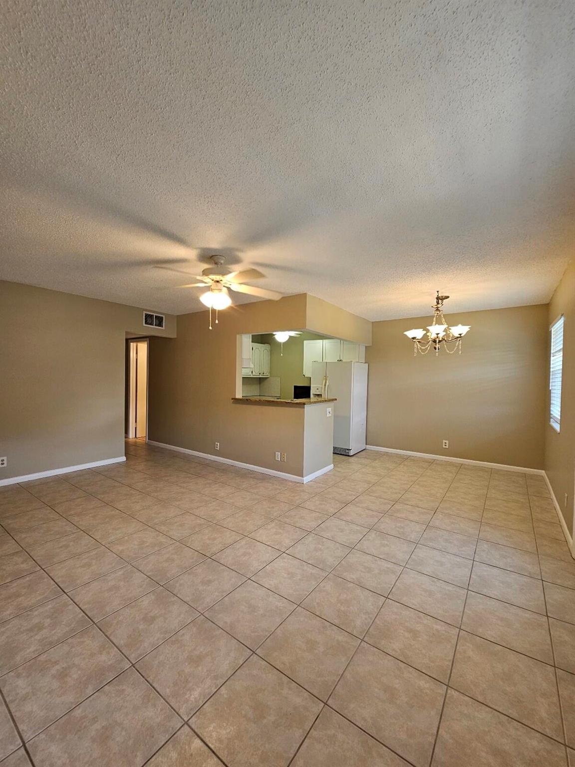 Bright & Updated 2-Bed, 1.5-Bath Condo in Active 55+ Community!Located on the 2nd floor of a well-maintained building, this inviting unit features a modern kitchen, ceramic tile throughout, and a private balcony with peaceful green space views. Enjoy the comfort and convenience of low-maintenance living paired with resort-style amenities. The vibrant 55+ community offers everything from live shows, movies, and clubs to two outdoor pools and a fully equipped clubhouse. Amenities include an indoor pool, theater, card and party rooms, billiards, shuffleboard, tennis, pickleball, bocce courts, and more. Experience the lifestyle you've been waiting for!