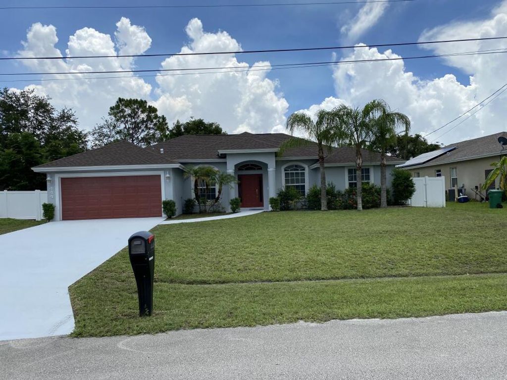 Photo of 444 SW Saginaw Avenue, Port Saint Lucie, FL 34953 (MLS # R10819233)