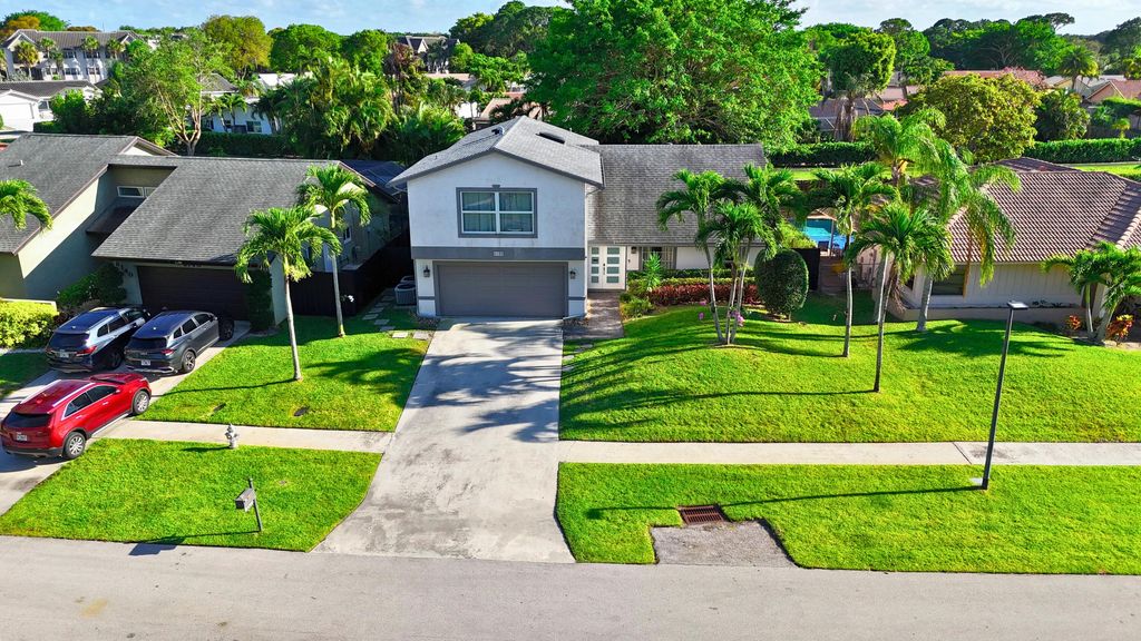 Photo of 6150 Amberwoods Drive, Boca Raton, FL 33433 (MLS # B26014370)
