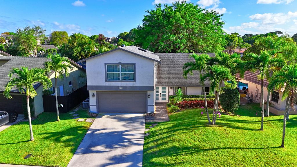 Photo of 6150 Amberwoods Drive, Boca Raton, FL 33433 (MLS # B26014370)