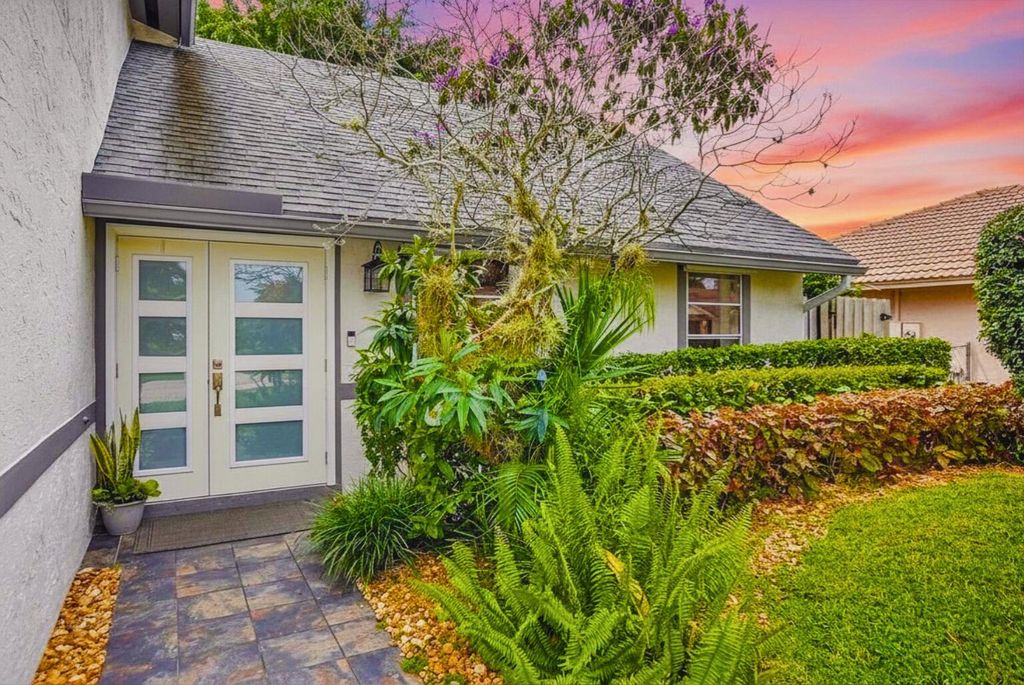 Photo of 6150 Amberwoods Drive, Boca Raton, FL 33433 (MLS # B26014370)