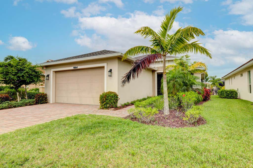 Photo of 9864 SW Trumpet Tree Circle, Port Saint Lucie, FL 34987 (MLS # R10790390)