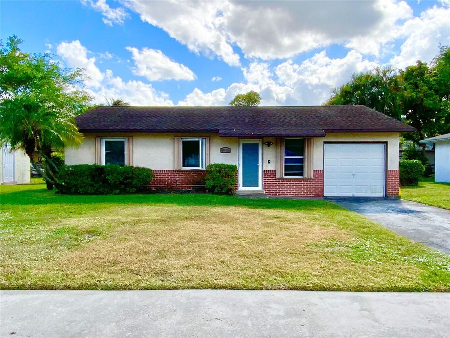Charming and cozy 3 bed, 2 bath home nestled in the vibrant community of North Lauderdale.  Offering beautiful, large front and backyards-perfect for entertaining.  No HOA! Many important updated features include impact windows and doors (2018)- full peace of mind.  AC (2018), updated electric panel (2017) with newer outlets (2022), washer & dryer approx. 3 years old, and a 2-year-old stove. Home offers great potential and needs just a little TLC - is priced accordingly.  Perfect opportunity to own a well-maintained property with valuable upgrades already in place.