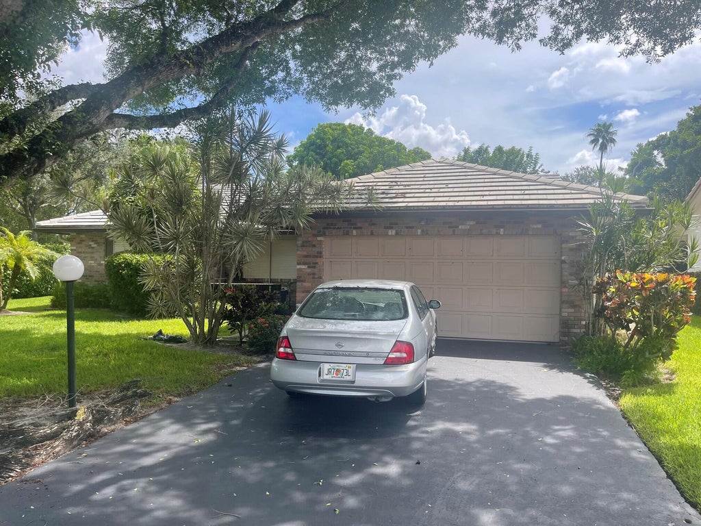 Photo of 10895 CYPRESS RUN Circle, Coral Springs, FL 33071 (MLS # B26078780)