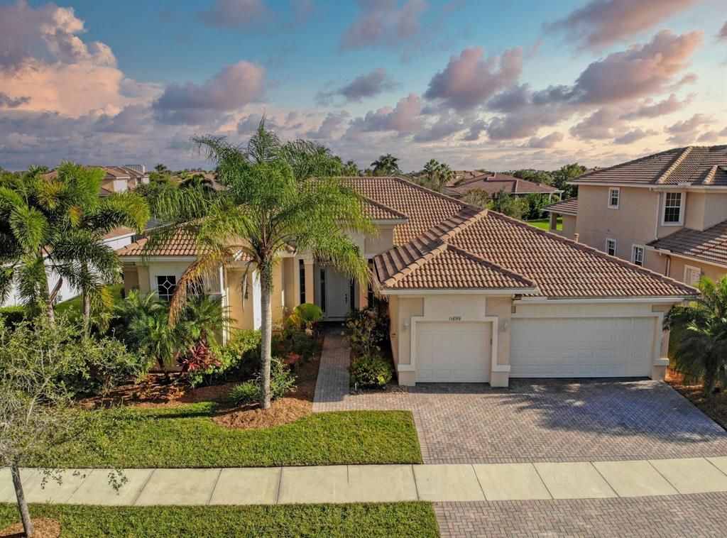 Photo of 11699 SW Aventino Drive, Port Saint Lucie, FL 34987 (MLS # R10754168)