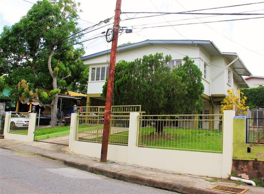 This Spacious 4 Bedroom 2 Bath Single Family home (4TH bedroom dedicated as a Den) is located in SAN FERNANDO (TRINIDAD) a 1/4 mile West of San Fernando-Siparia-Erin Rd. The home has been well maintained with many recent updates to the Kitchen & Bathrooms. The roof is a few years old & AC units are newer. ALL Furniture & Appliances are included. The home's PRIME location provides easy access to the main highways & is approximately 1 mile from Gulf City Shopping Mall, 3 Major Medical Centers & The San Fernando General Hospital. It is also walking distance to Churches & Schools. Dining & Entertainment options abound in San Fernando, including Trendy Restaurants & Bars. PALMISTE PARK a 40-acre recreational haven is 10 minutes away & the Beach is 5 minutes away! Stated Price is in US currency