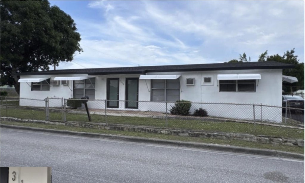 Photo of 3116 R J HENDLEY Avenue, Riviera Beach, FL 33404 (MLS # B26082964)