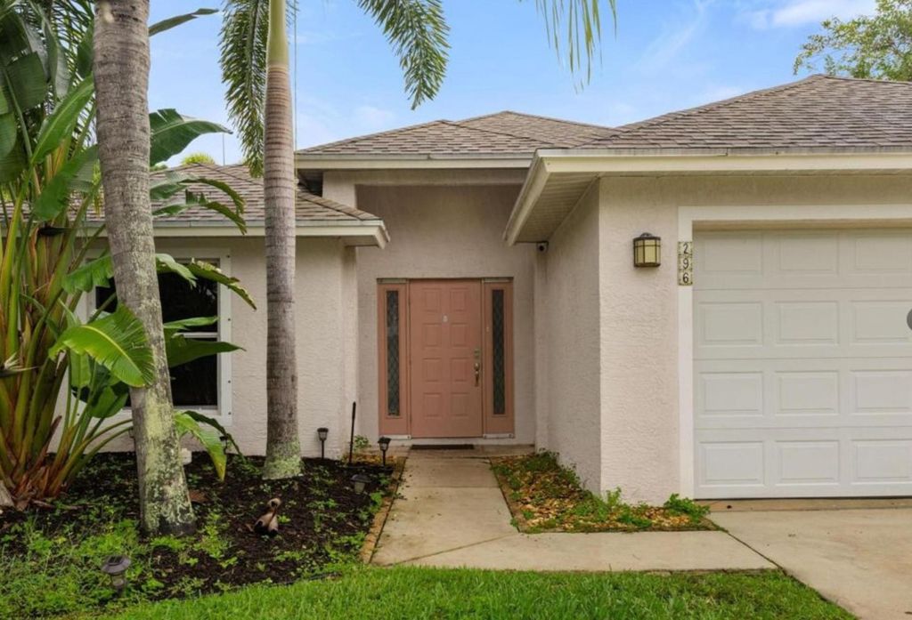 Photo of 296 SW Panther Trace, Port Saint Lucie, FL 34953 (MLS # F10527372)