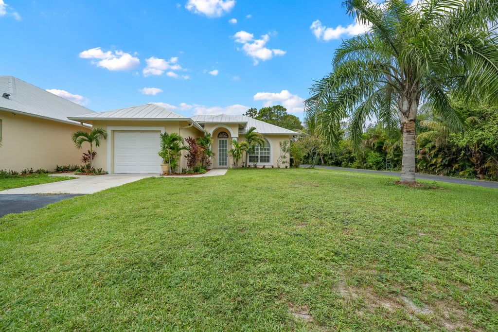 Photo of 12094 Citrus Grove Boulevard, West Palm Beach, FL 33412 (MLS # R11115123)
