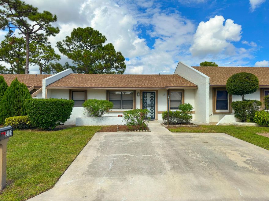 WELCOME TO THIS SPARKLING, MOVE-IN READY  2 BEDROOM VILLA WITH CONVENIENT FRONT DOOR PARKING, AN UPDATED ROOF, &  A DEN THAT CAN EASILY BE CONVERTED TO A THIRD BEDROOM.  APPEALING FEATURES INCLUDE VOLUME CEILINGS IN THE LIVING AREA, FRESH PAINT THROUGHOUT, A STORAGE ROOM & A LARGE SCREENED PATIO OPEN TO THE KITCHEN FOR ENTERTAINING. THE A.C. WAS REPLACED IN 2022 & THE WATER HTR WAS REPLACED APPROXIMATELY 6 YEARS AGO. THE HOA FEE INCLUDES CABLE TV, MASTER INSURANCE, ROOF, LAWN MAINTENANCE, SPRINKLERS,  & THE CLUBHOUSE WITH ITS POOL, TENNIS, & SHUFFLEBOARD. A 55+ AGE RESTRICTED COMMUNITY. 1 SMALL PET OK WITH HOA APPROVAL.