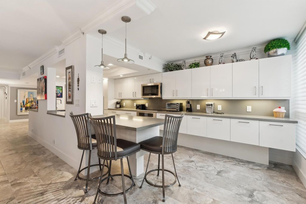 Photo of 20100 Boca West Drive #114, Boca Raton, FL 33434 (MLS # R10973558)
