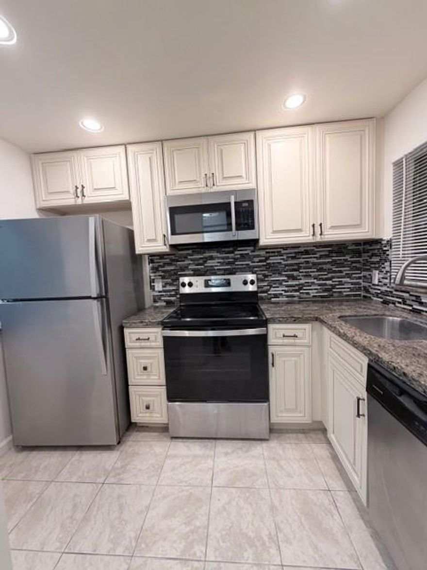BEAUTIFULLY UPDATED KITCHEN AND BATHROOM. STAINLESS STEEL APPLIANCES AND GRANITE COUNTER
TOPS WITH GORGEOUS BACK SPLASH. TOP FLOOR WITH ELEVATOR ACCESS. LIGHT AND BRIGHT!! ONE
ASSIGNED PARKING PLUS 1 GUEST PARKING AVAILABLE. CLOSE TO I95 AND TURNIPIKE, GREAT SCHOOLS, AND WALKING DISTANCE FROM WALMART, PUBLIX, BANKS, PHARMACY, ETC.