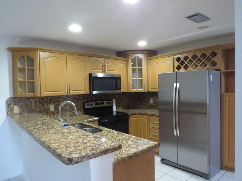 Photo of 3430 NW 21st St, Coconut Creek, FL 33066 (MLS # F10542531)