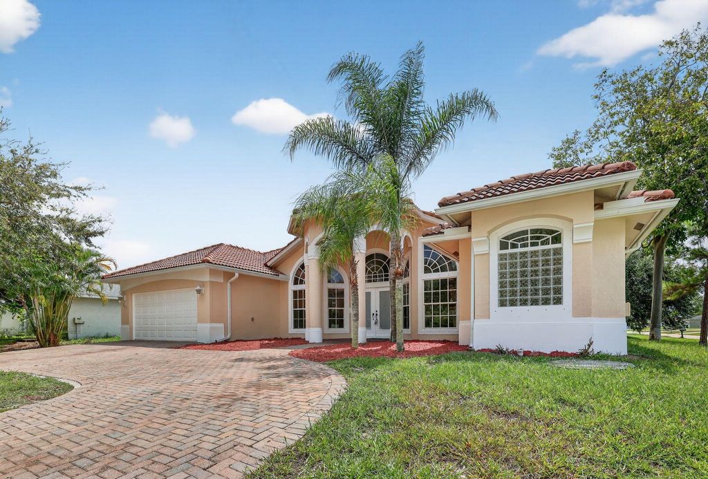 Photo of 392 SW Kane Avenue, Port Saint Lucie, FL 34953 (MLS # R11122428)