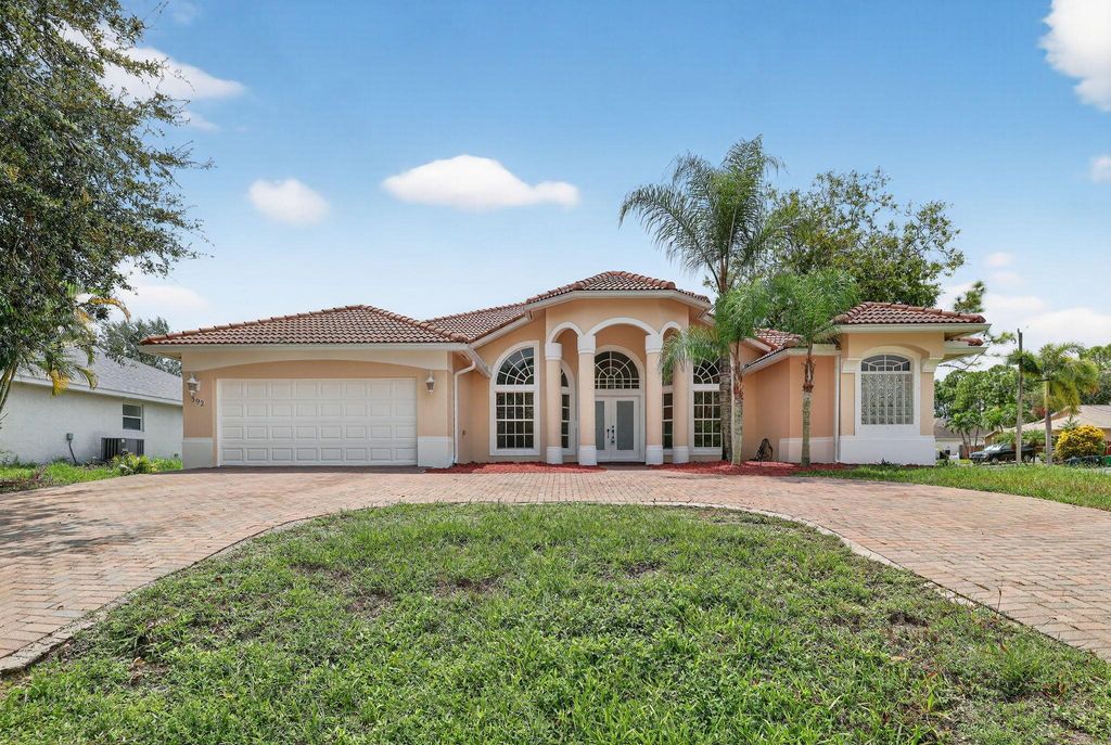 Photo of 392 SW Kane Avenue, Port Saint Lucie, FL 34953 (MLS # R11122428)