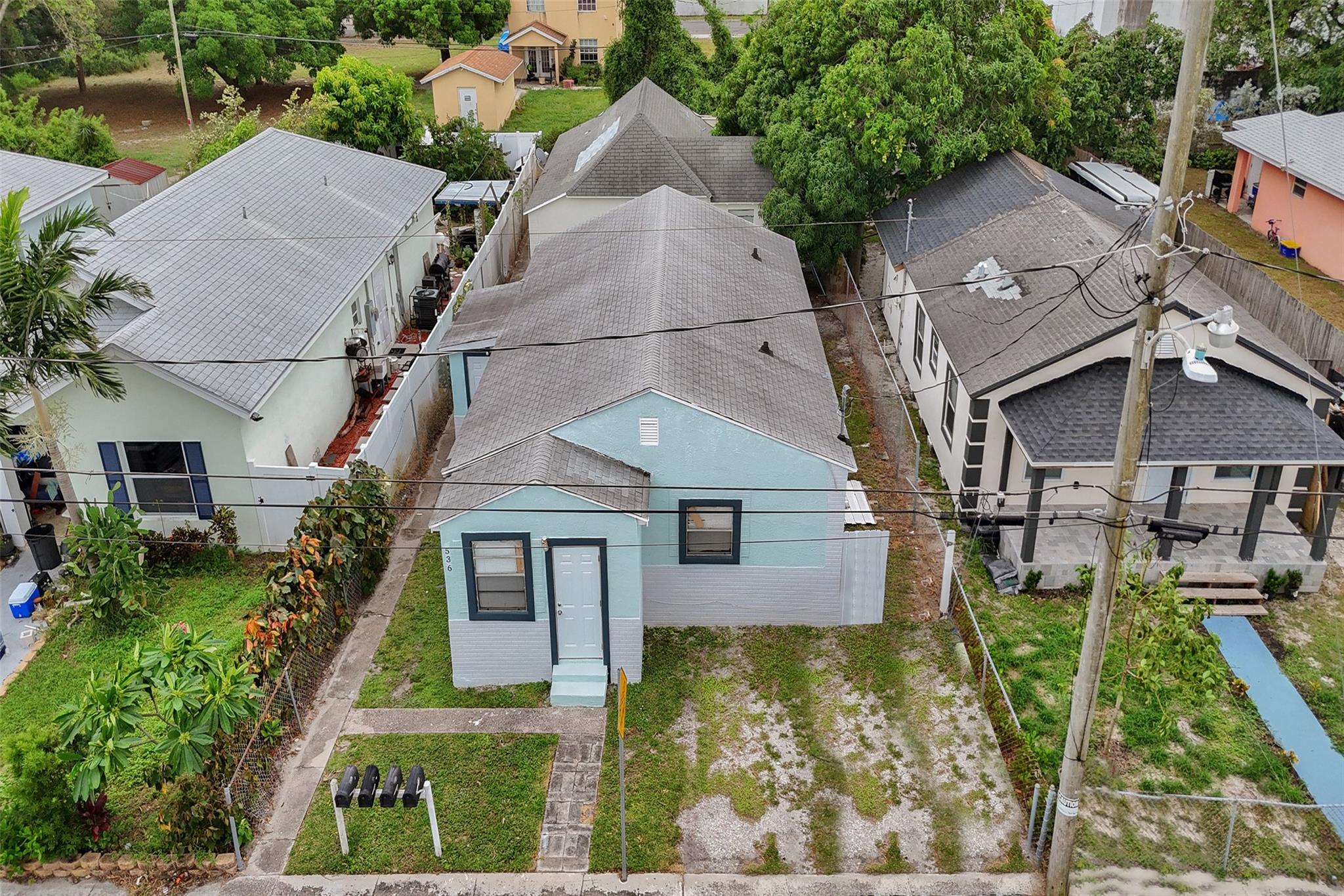Discover a rare opportunity to own a value-add quadplex in the heart of West Palm Beach. 3 of the 4 units are currently rented under market value, generating a total monthly income of $3,750 with individual rents of $1,200, $1,250, and $1,300. Upside is huge for the experienced investor, with updated 2 bed rentals in the area fetching over $1700 per month. 10 minutes from Downtown, the beach, Worth Avenue, and so much more, this property is perfectly positioned to capitalize on some forced appreciation in addition to the area's rapid growth and natural market appreciation. With the Palm Beach International Airport nearby, this location attracts a diverse range of tenants, ensuring strong rental demand. Drive-By viewings only until receiving a qualified offer. Please do not disturb tenants.