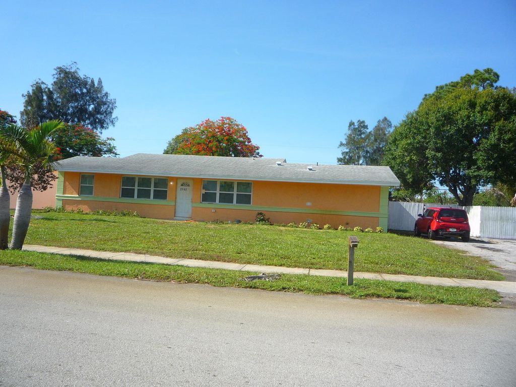 Photo of 2162 NW 28th Street, Oakland Park, FL 33311 (MLS # B26044495)