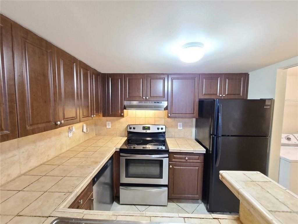 Photo of 1727 Village Blvd #102, West Palm Beach, FL 33409 (MLS # F10317474)