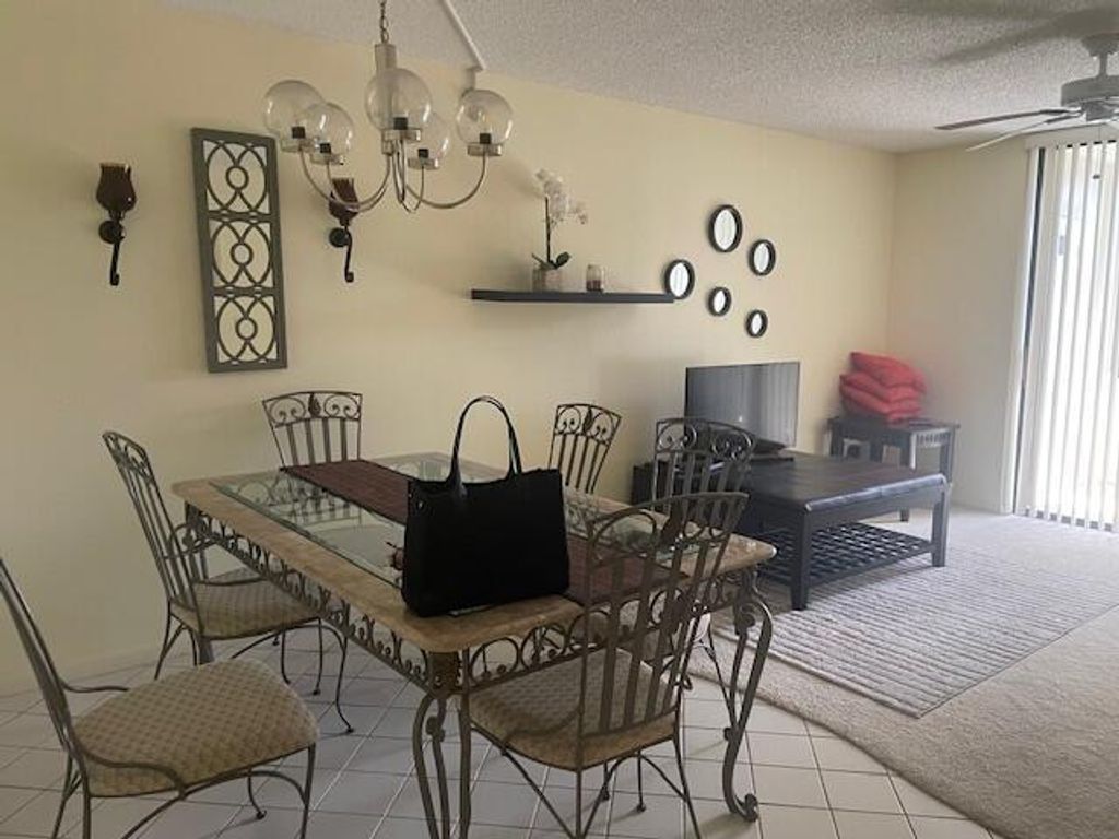 Photo of 5160 Las Verdes Circle #309, Delray Beach, FL 33484 (MLS # R11020417)