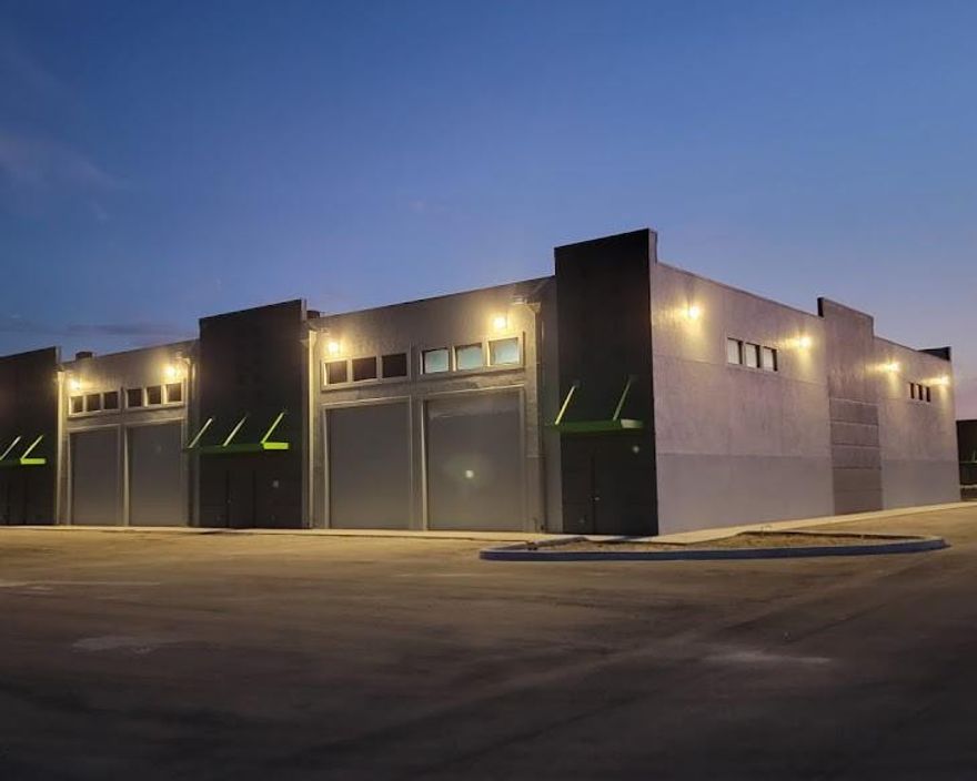 Owner financing, Incoming producing. Treasure Coast Vault offers premium small-bay industrial units and gated mancaves in fully climate-controlled, concrete block buildings with 20ft ceilings. Each unit features impact windows, insulated 13’x14’ overhead doors with openers, 125 Amp 3-phase power, oversized bathrooms (plumbed for future shower), fire sprinklers, wide drive aisles, ample parking, RV dump station, wash-down areas, and loading zones. Perfect as a secure business space, workshop, man cave/she shed, or personal retreat — a high-quality, customizable investment with unmatched security and features.